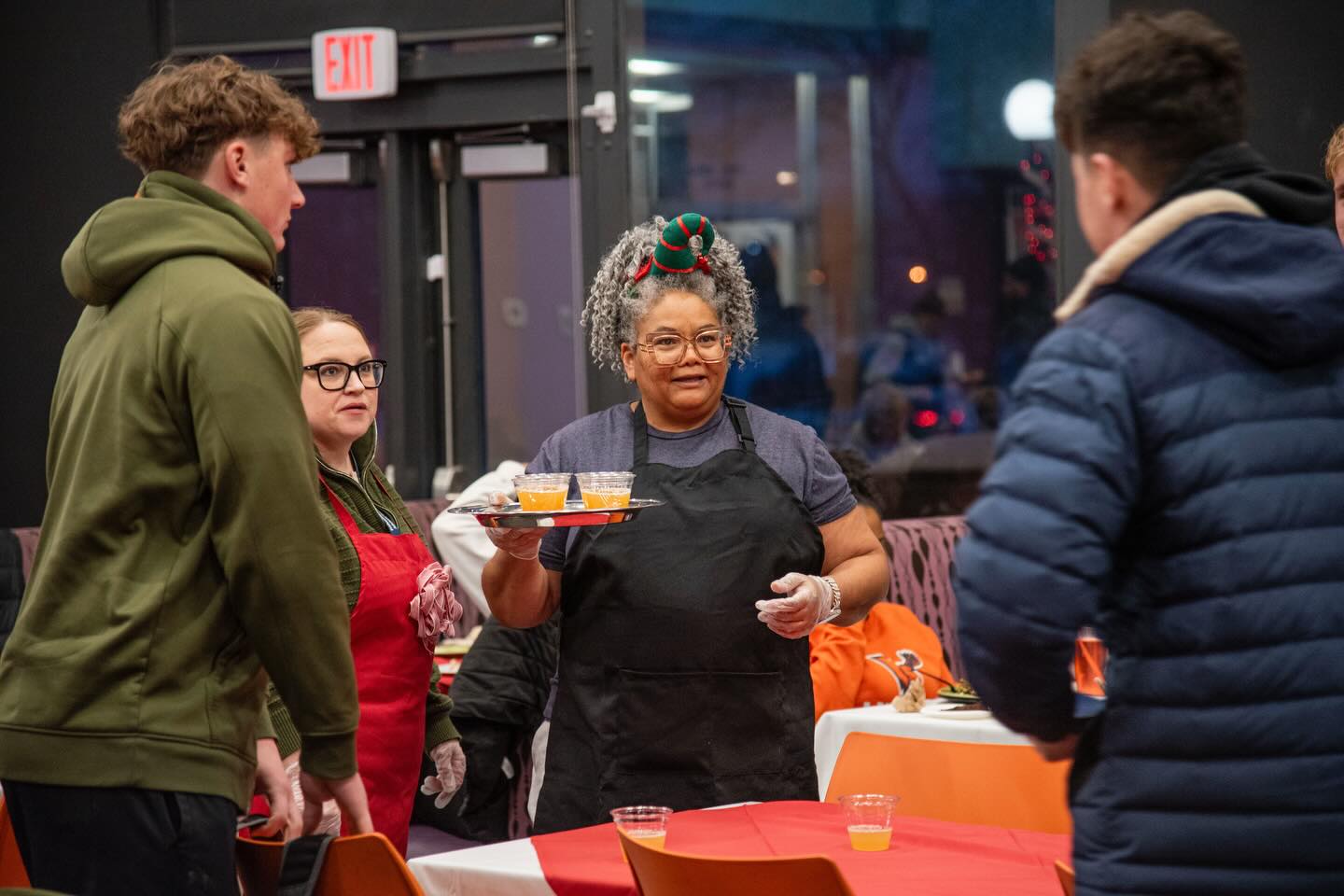 Students waited on by faculty and staff at the 2025 Holiday Dinner.