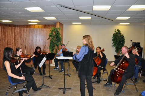 Members of the Utica University String Ensemble perform.